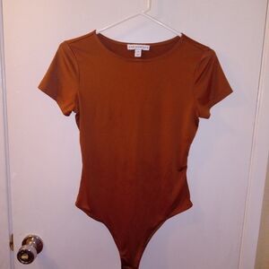 And Now This Bodysuit